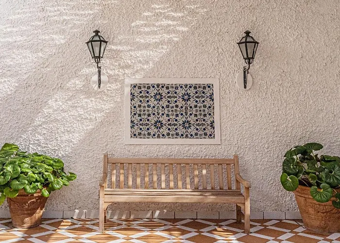 Отель Botania Relais & - The Leading Of The World 5*